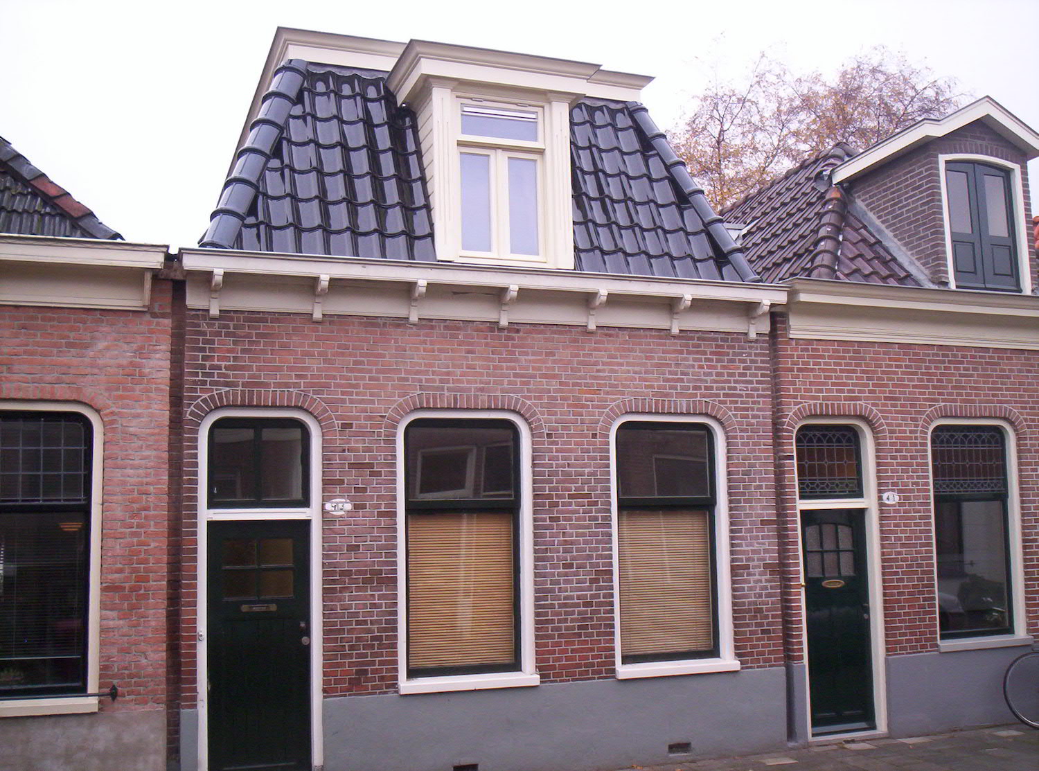 Nieuwe kap met dakapellen Nieuwstraat 43 te Groningen
